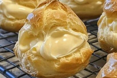 Thumbnail for Custard-Filled Cream Puffs: Light, Golden Pastries with Silky Vanilla Custard